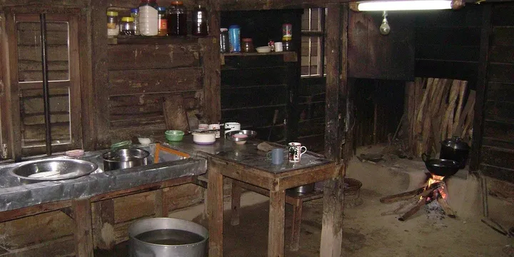 The Institute of Goodwill Foundation's (IGF) Reformed Edu-Care Centre's (REC) ground floor kitchen currently has a dirt floor and dirt stove.  No faucets appear at the sink as there is no running water.